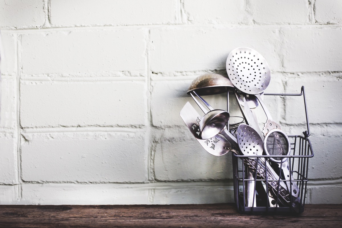 cooking utensils in kitchen toss these things from your house for instant happiness