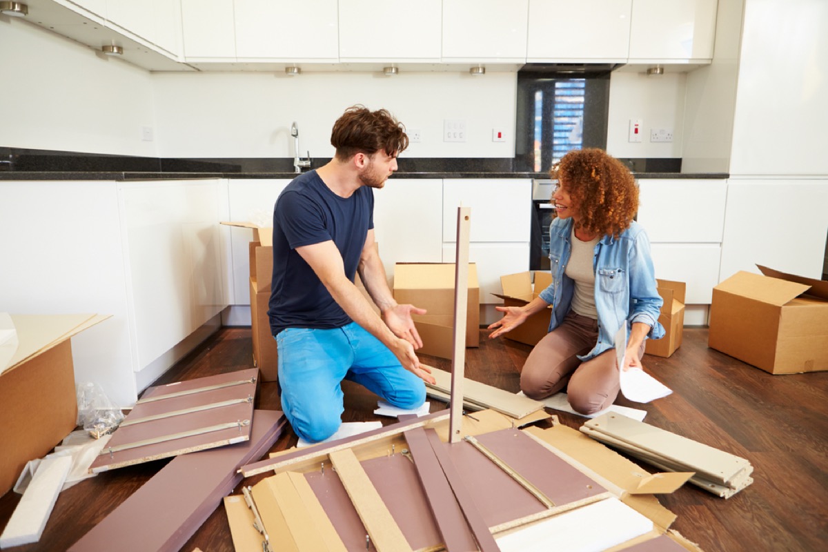 couple putting together furniture, relationship white lies