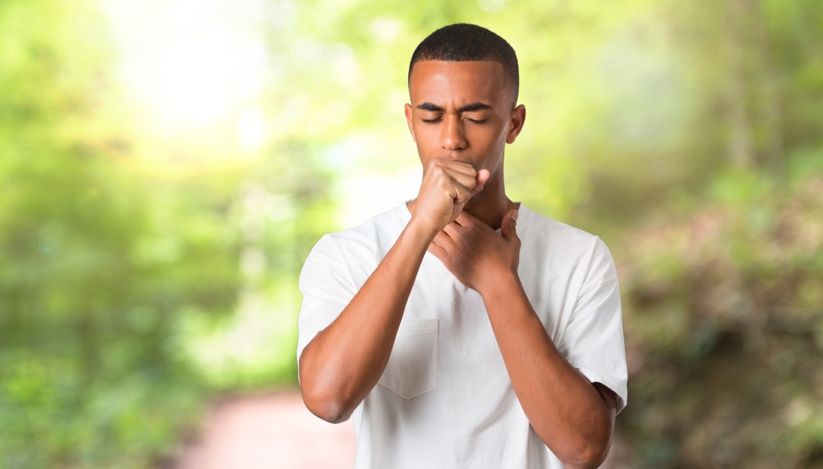 Man Coughing Symptoms of Cancer