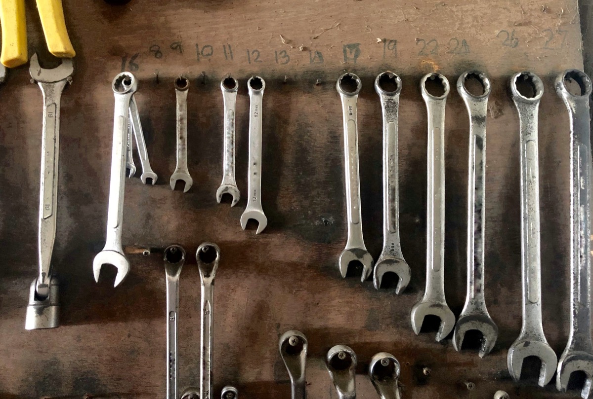 old tools in garage of home toss these things from your house for instant happiness