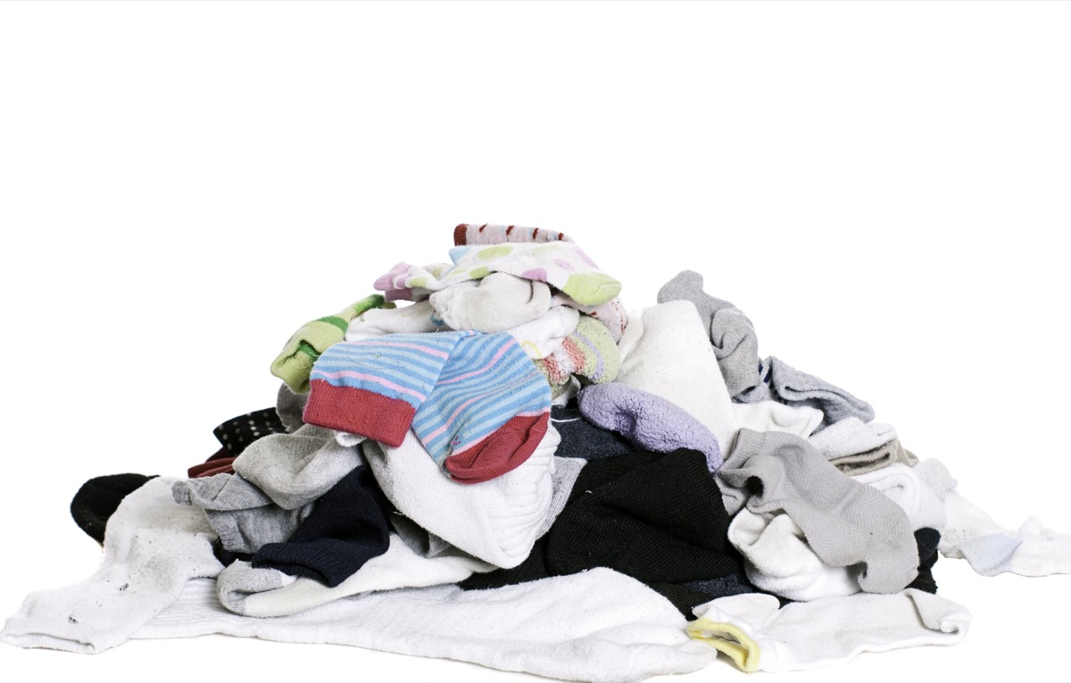 pile of mismatched socks toss these things from your house for instant happiness
