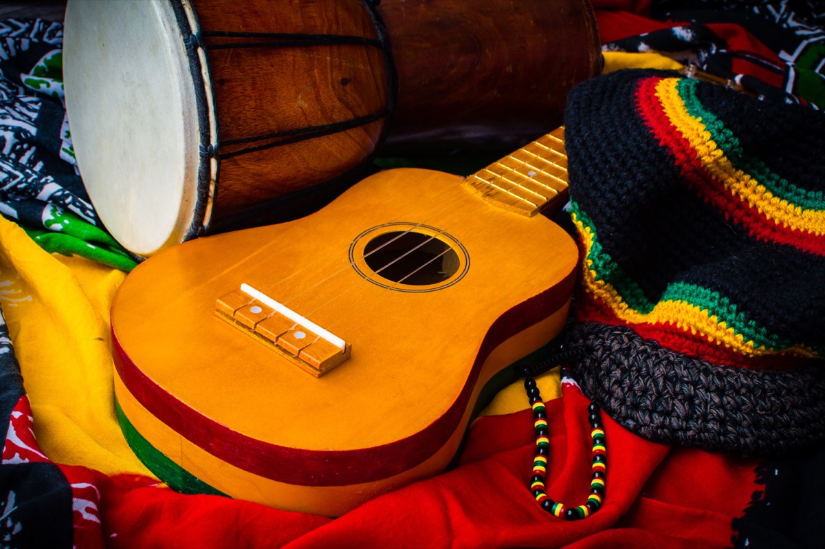 a reggae background with guitar and drum, new words coined