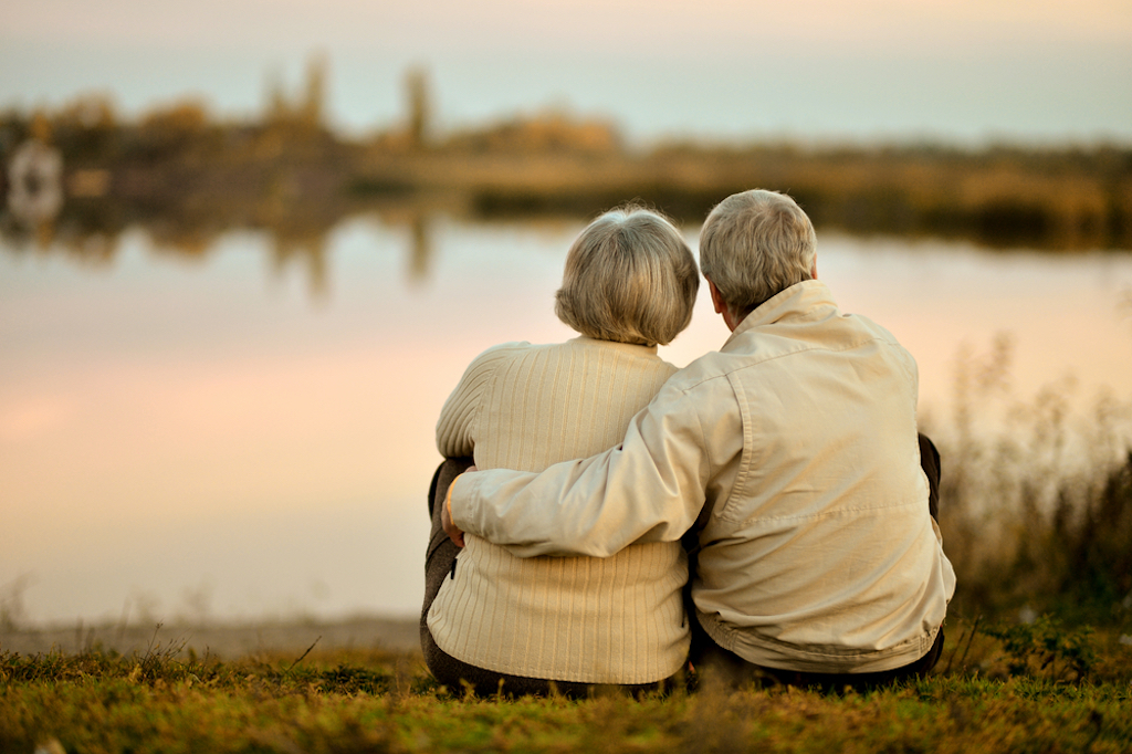 happy elderly couple gazing at sunset Lies Ex-Spouses