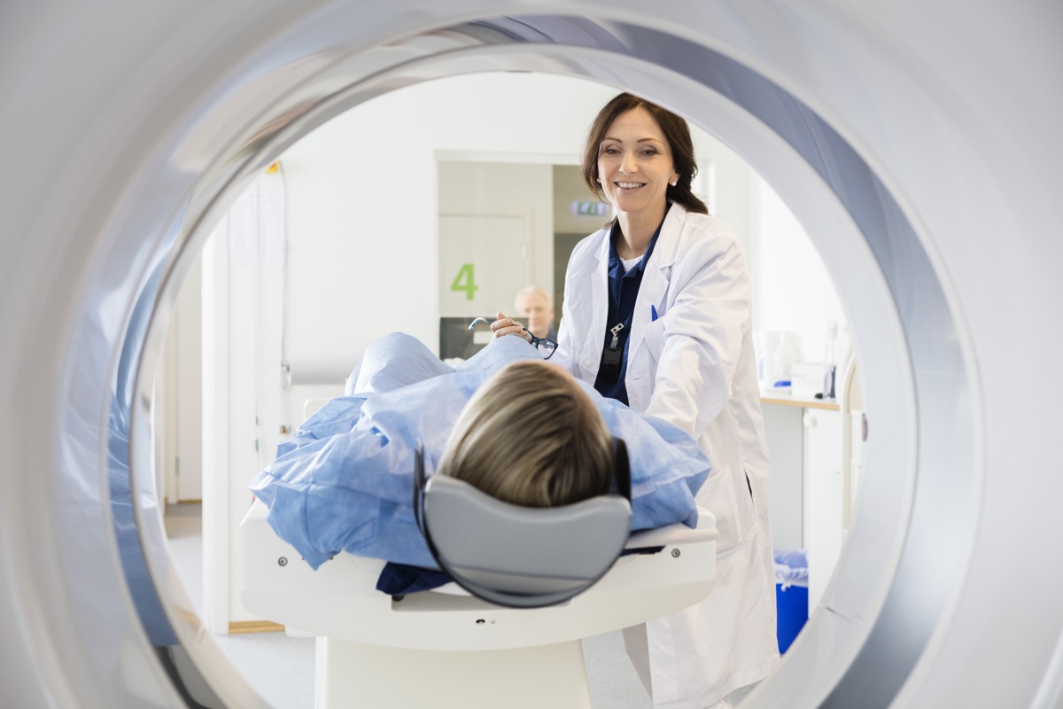 woman laying down about to get an MRI