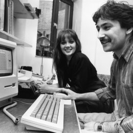 Yvonne Robertson and Nairish Nash at an apple ii computer in the 1980s