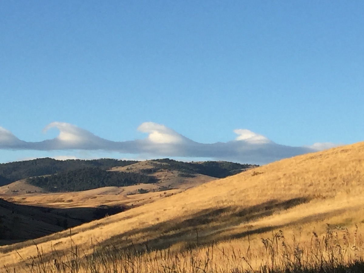 Clouds over hills