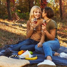 couple in love having a picnic, best anniversary date ideas