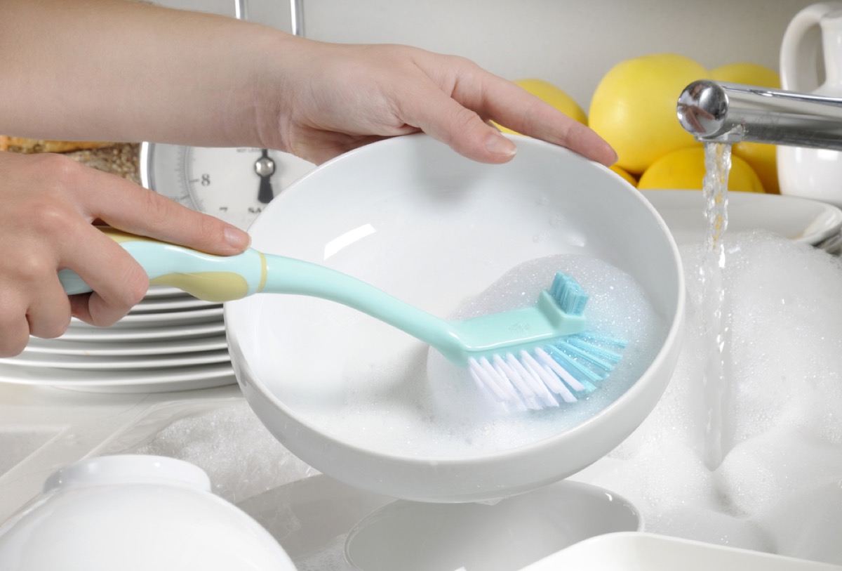 plastic scrub brush, how often you should replace your cleaning supplies