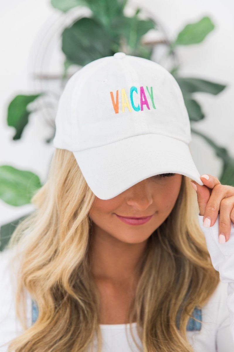 white cap with "vacay" in rainbow letters, cheap summer hats