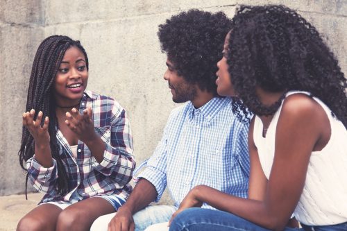 group of friends talking outside things you should never say to a single parent
