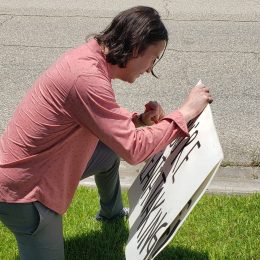 Keanu Reeves signs You're Beautiful poster for Louisiana family, the Hunts