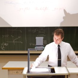 Teacher Using a Projector Old Classroom Objects