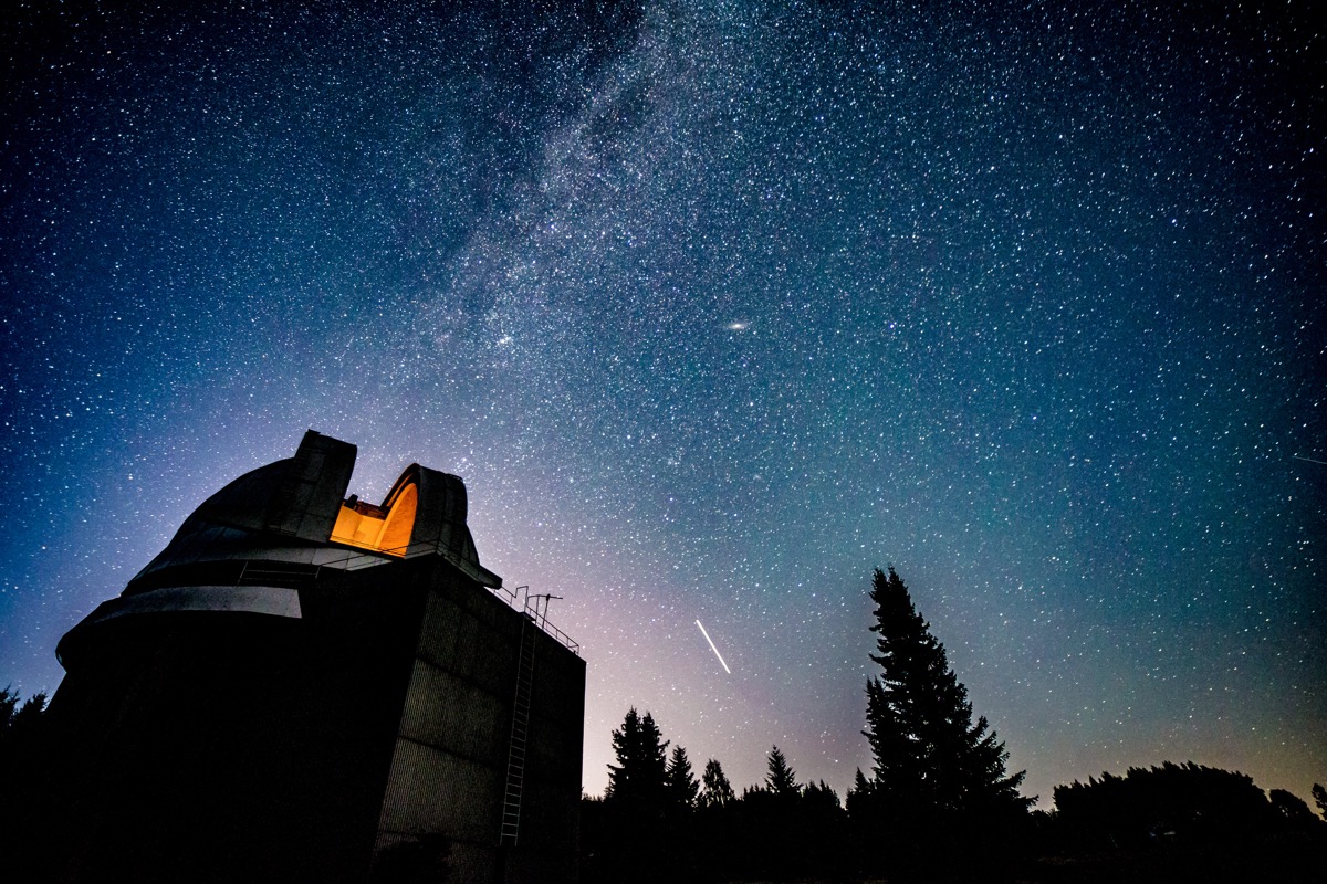 Milky way galaxy over observatory