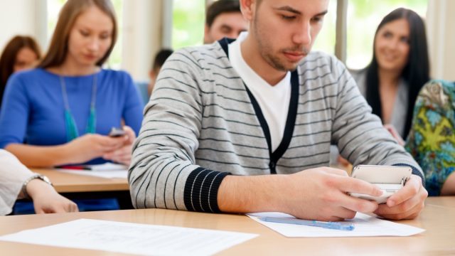 Students using their phones in class ways going back to school is different