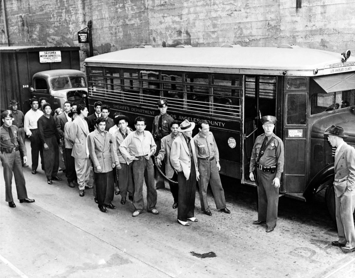 CWC1WC Zoot Suiters under arrest outside Los Angeles jail en route to court during the Los Angeles Zoot Suit Riots in June 1943 historical moments rarely taught in school