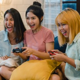 Asian Women Playing Video Games