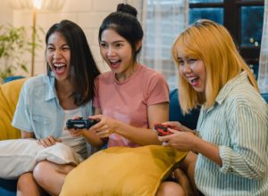Asian Women Playing Video Games