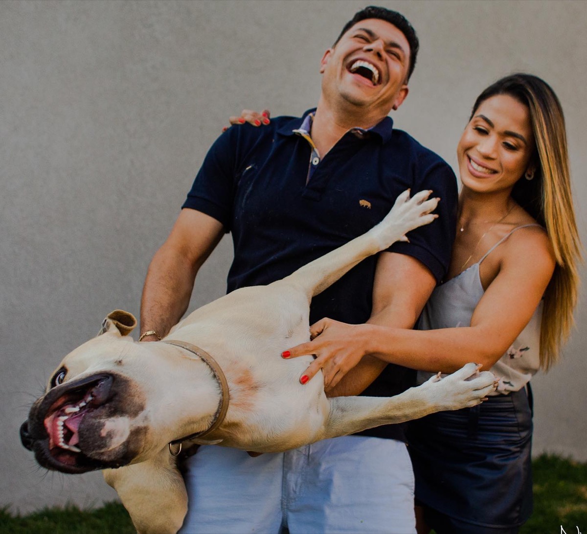 Thor dog photobombs couple's engagement shoot