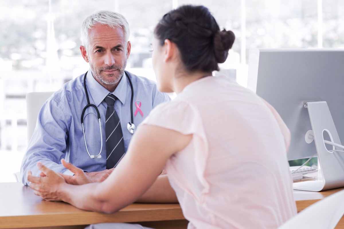 Breast cancer doctor talking to a patient
