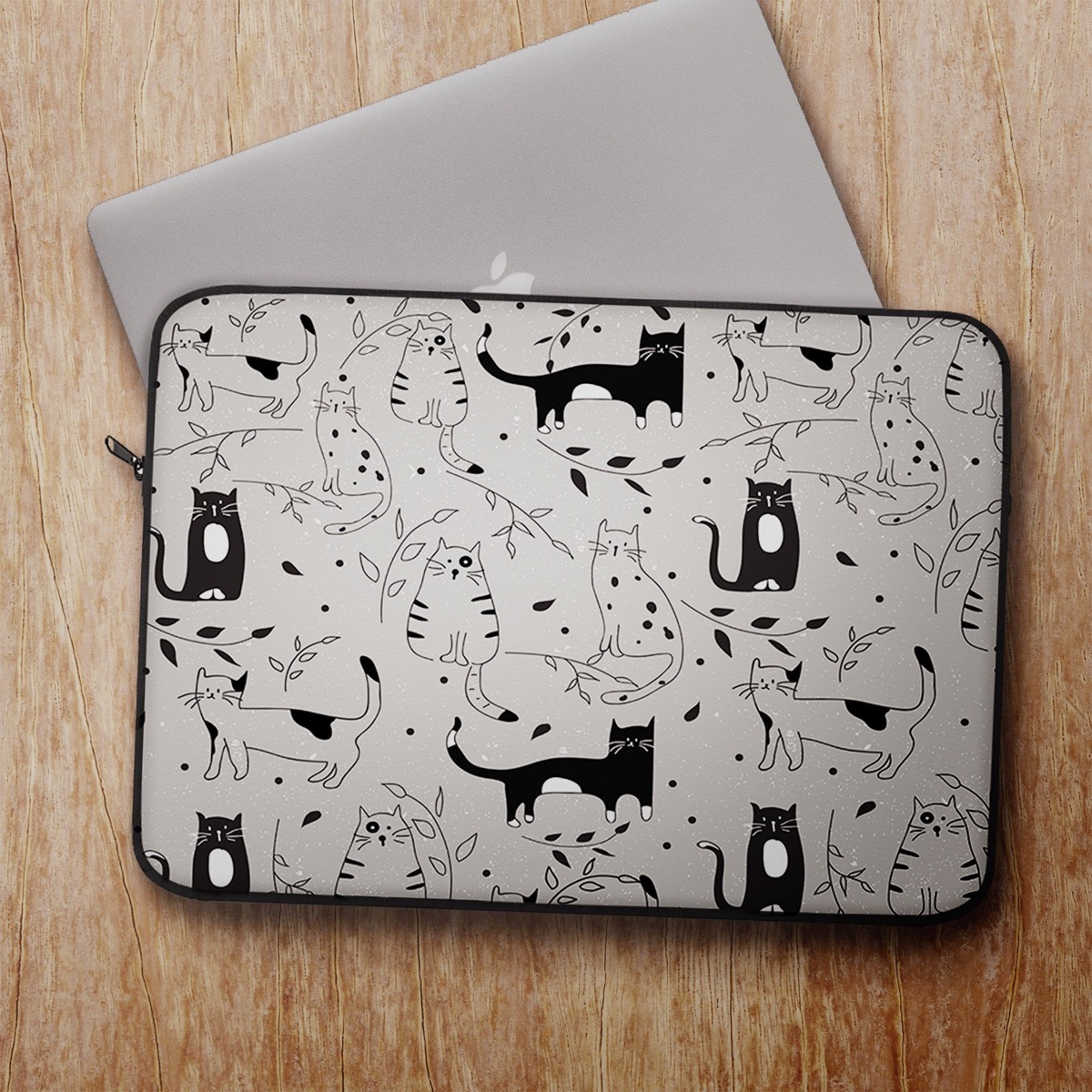 white laptop sleeve with black cats on it, cat gifts