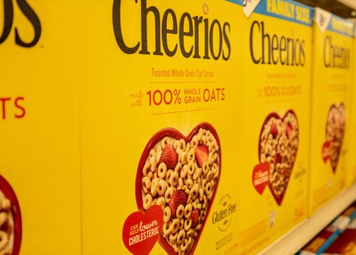 cheerios yellow box on the shelves of a grocery store, trademark failure
