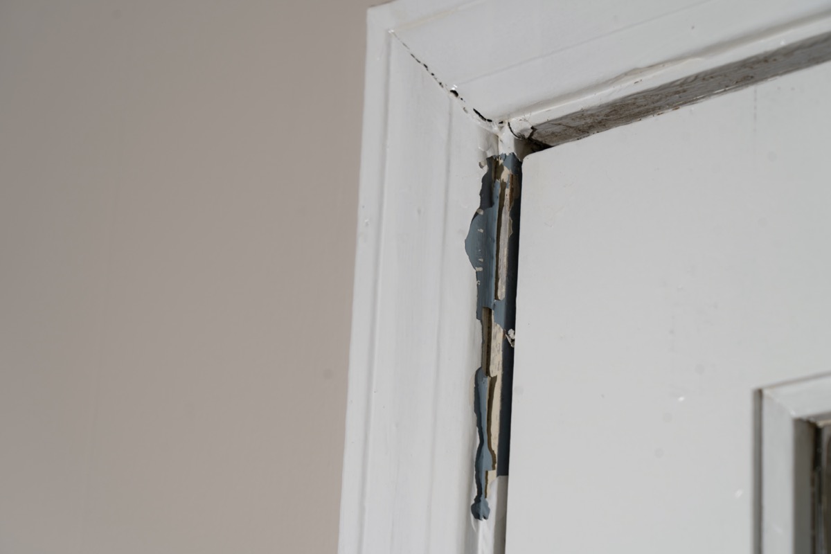 doorframe with cracking paint