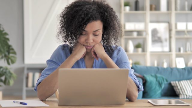 Woman Falling Asleep at a Laptop Health problems from lack of sleep