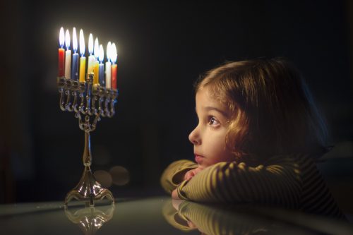 little girl looking at menorah, things that annoy grandparents