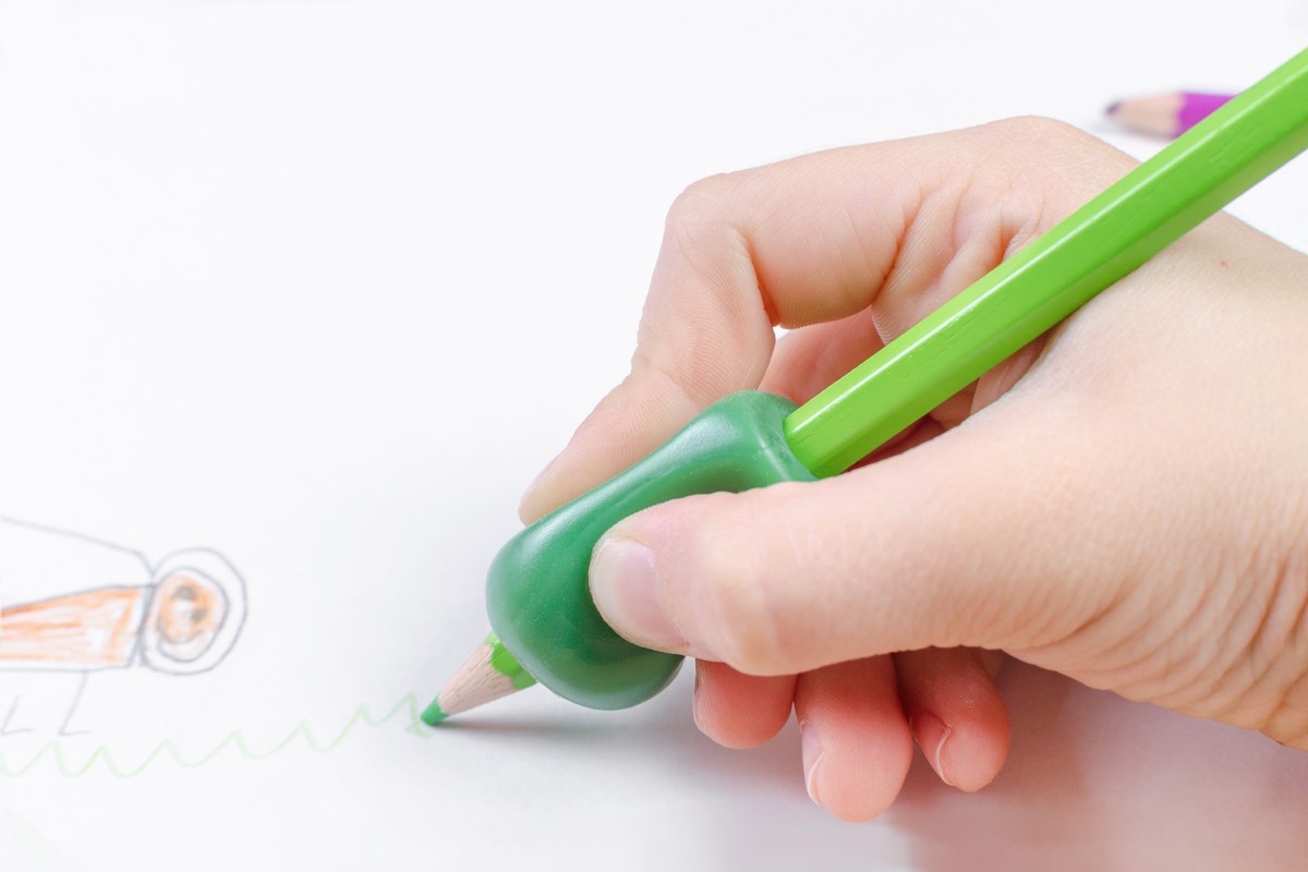 green pencil with green pencil grip