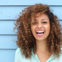 happy black woman outside, ways to feel amazing