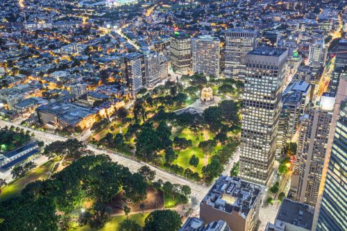 Elevated view of Hyde Park with Anzac War Memorial at dusk, Sydney, NSW, Australia