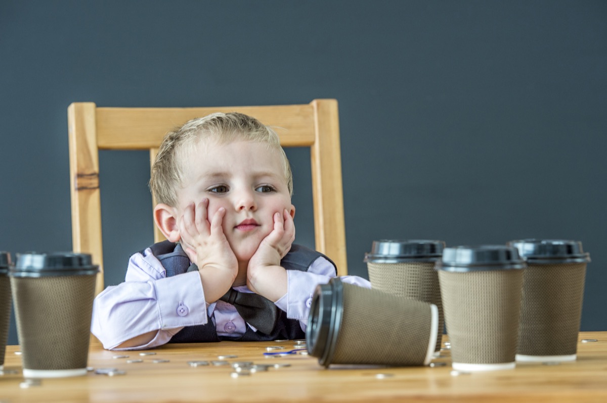Toddler Sitting With Coffee Cups Health Hazards Kids