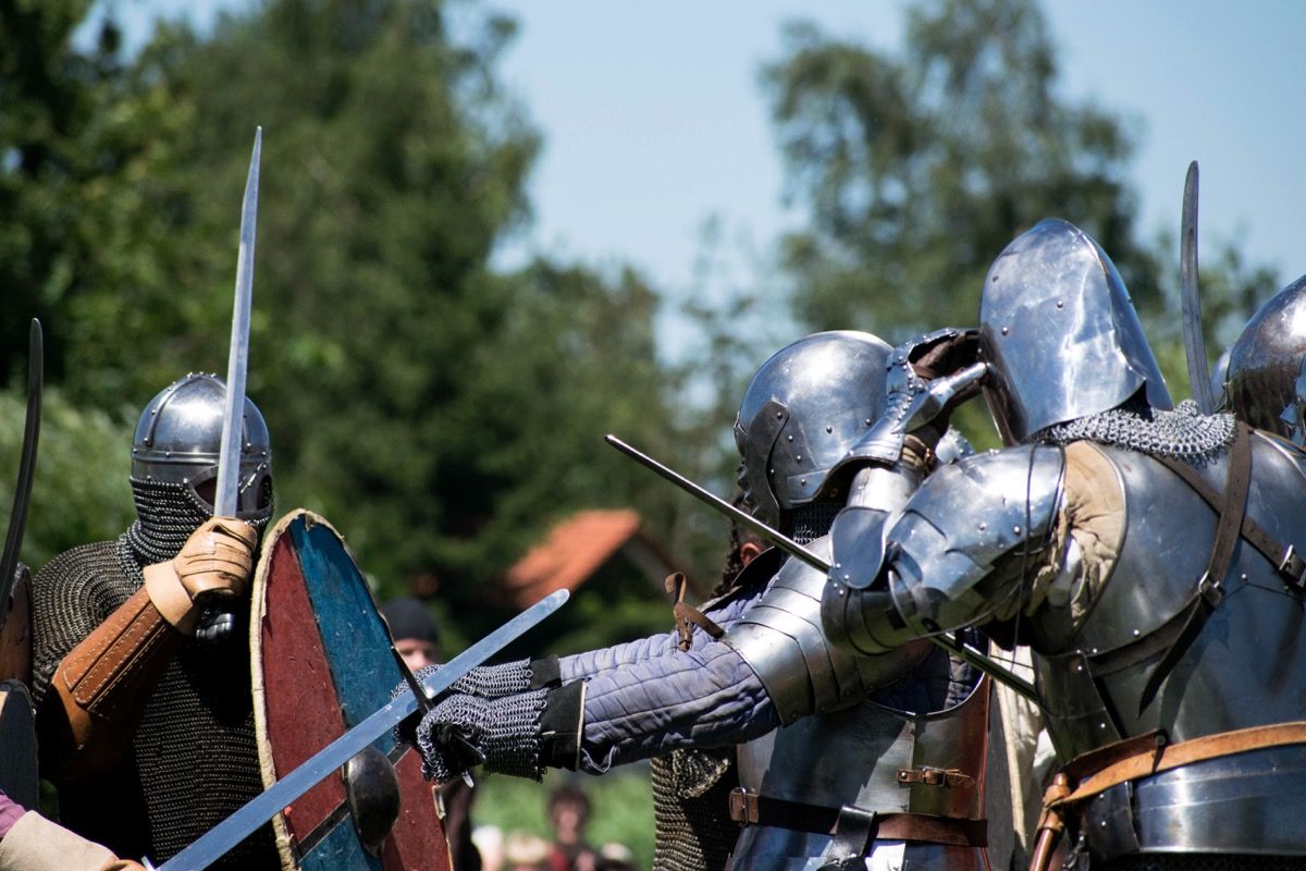 Three knights in medieval reenactment