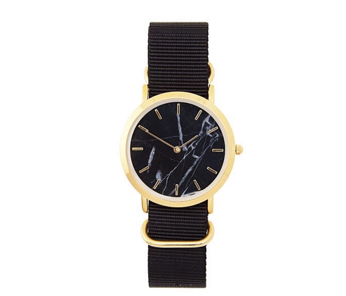 black nylon watch with black marble face and gold casing