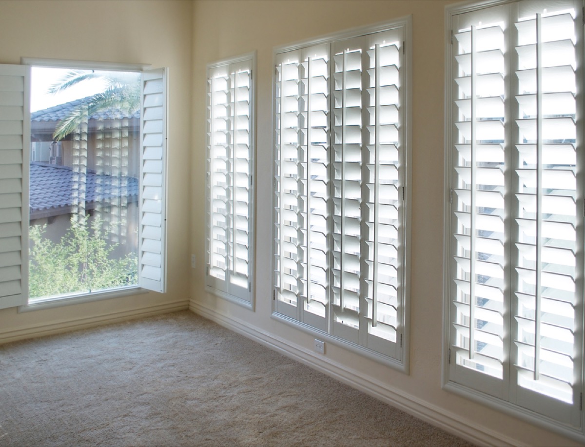 white room with plantation shutters, interior design mistakes
