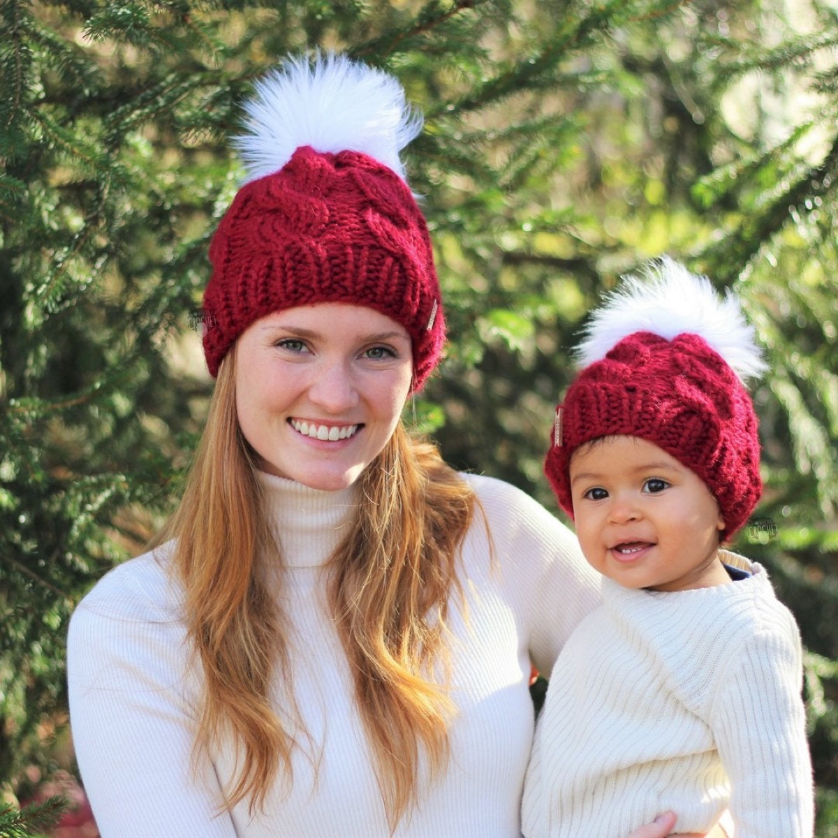 woman and baby in matching red hats with pom poms, mother daughter gifts
