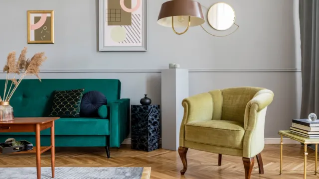 retro living room with green velvet chair and couch