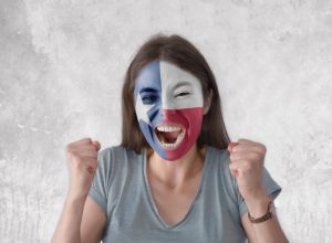 woman wearing texas flag face paint