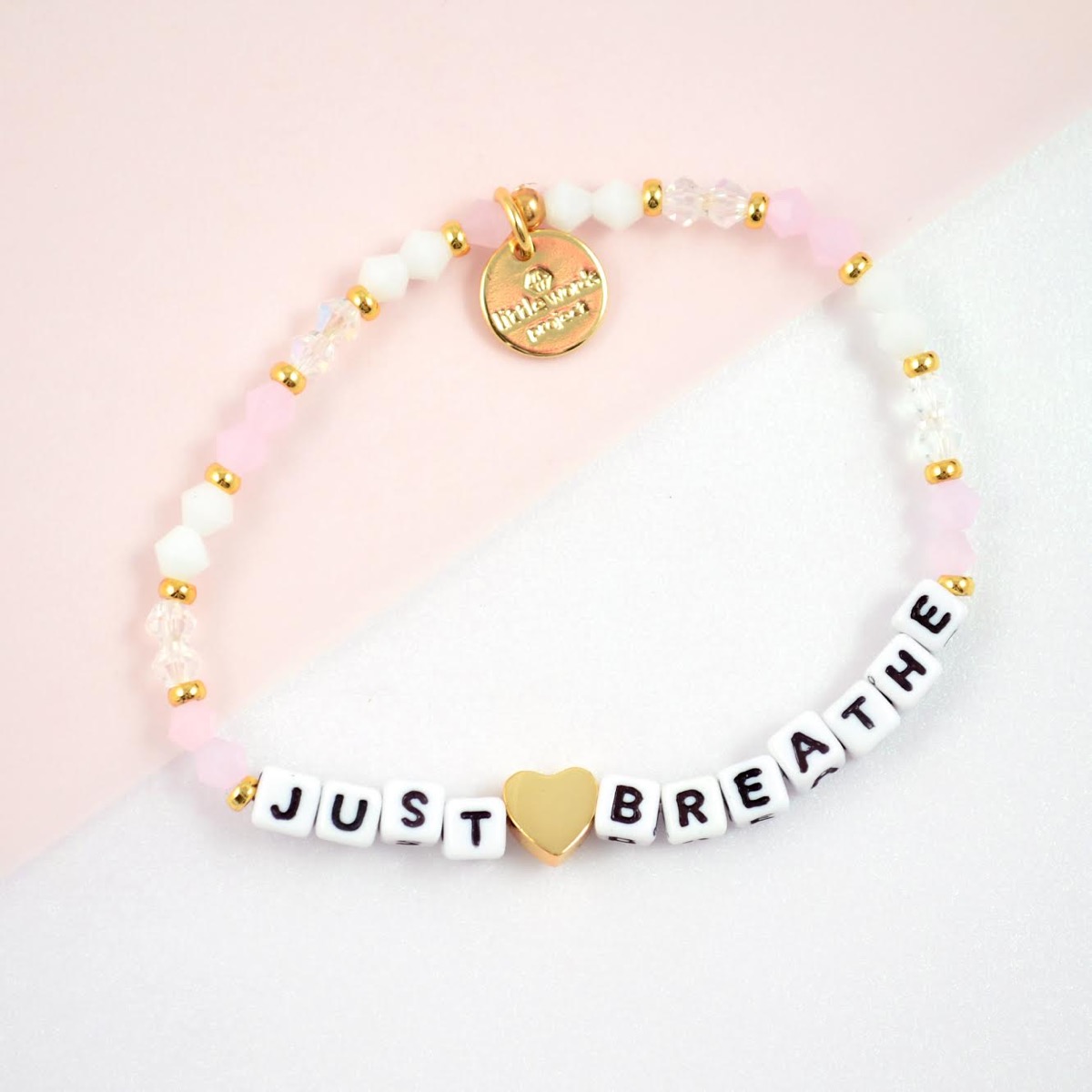 bracelet with the words just breathe on it