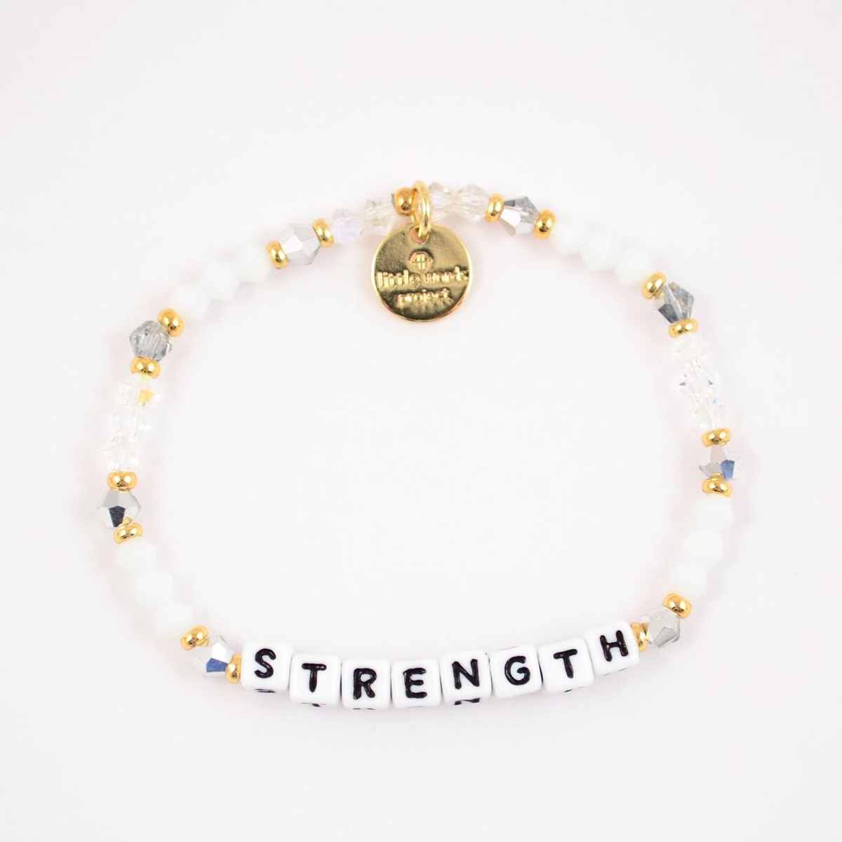 bracelet with the word strength on it
