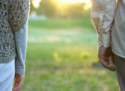 Older Couple Standing Apart, stopped having sex in marriage
