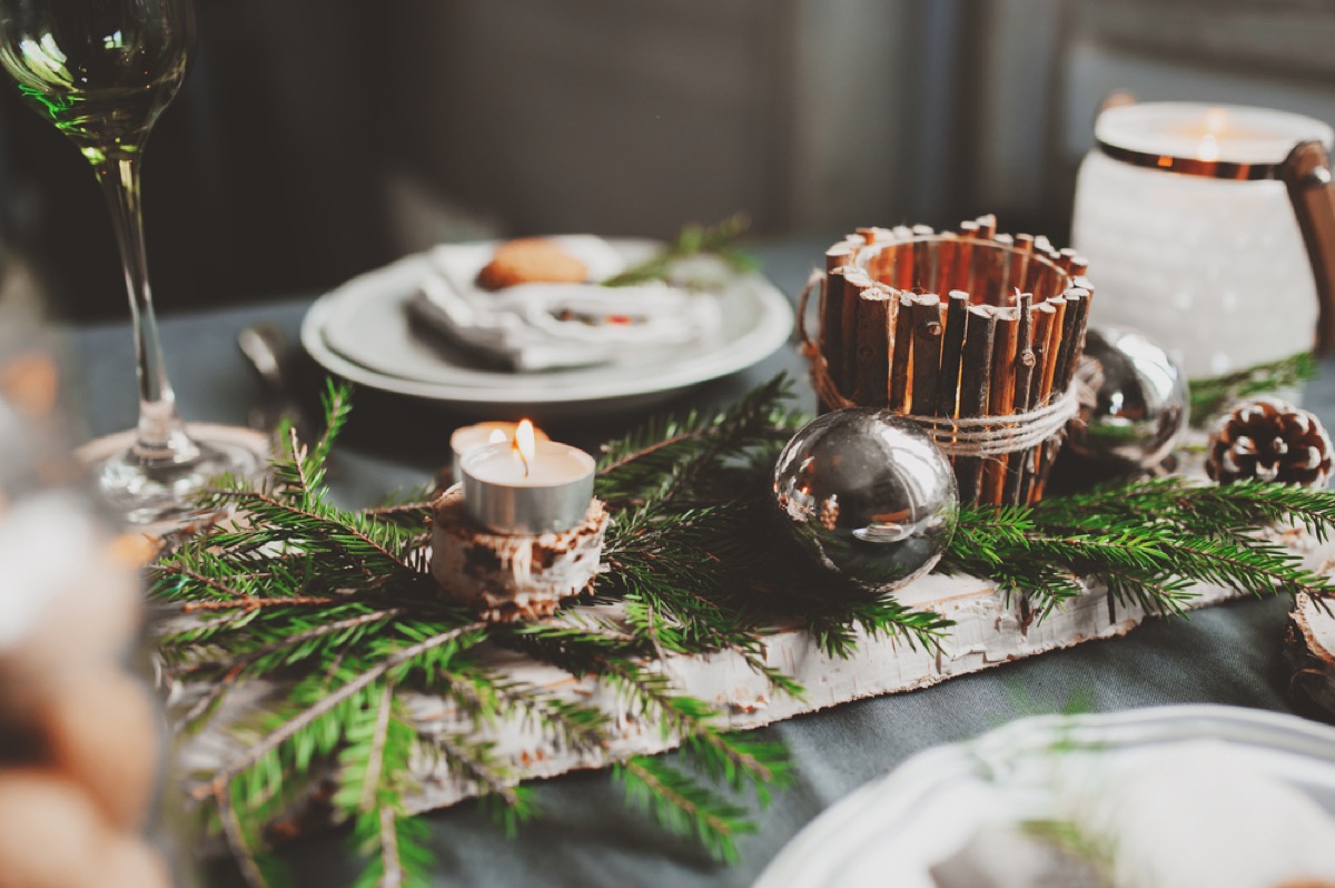branches on table with plates, fall decorating tips
