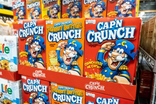 boxes of original capn crunch and peanut butter capn crunch at the supermarket