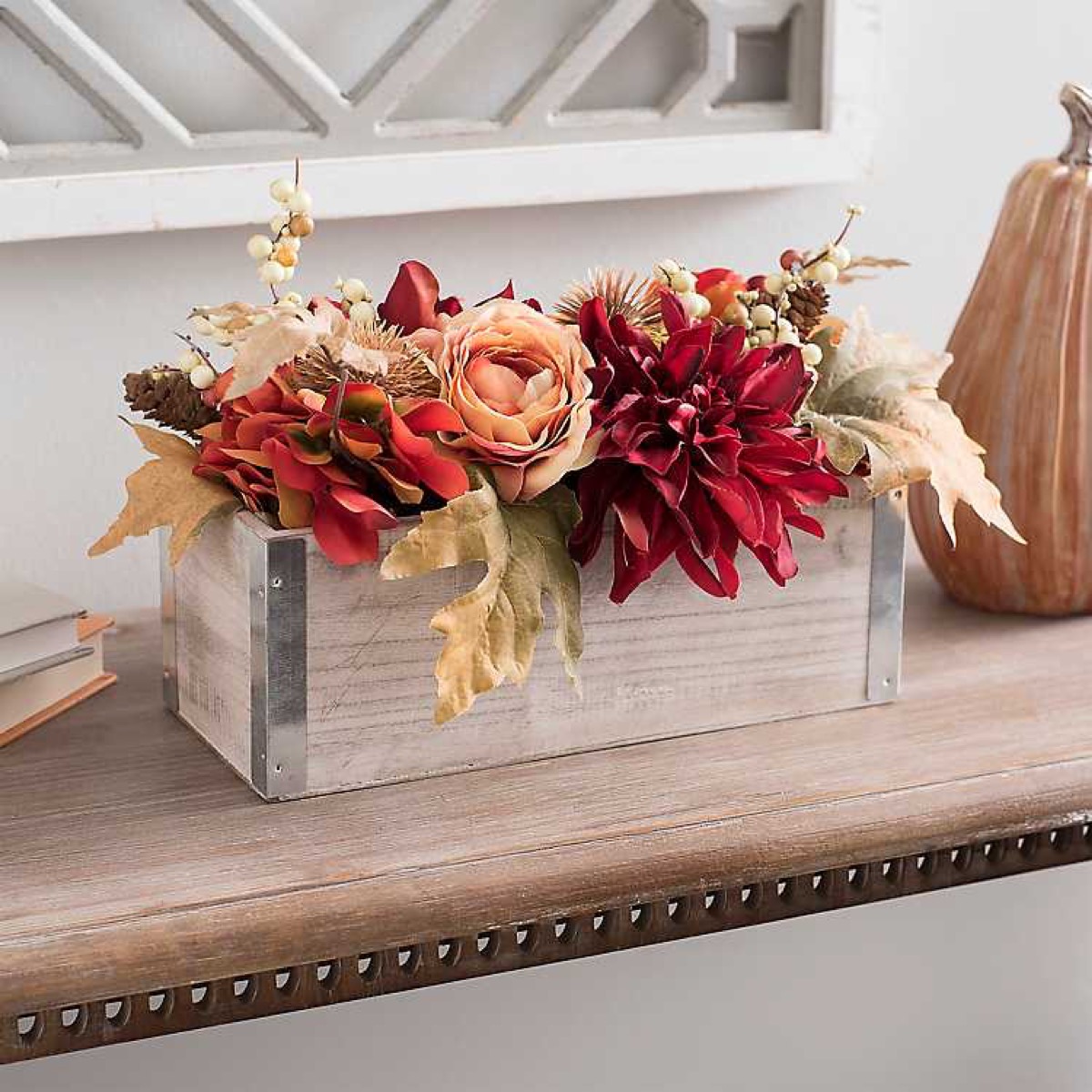 wooden planter with fake flowers, fall decorating tips
