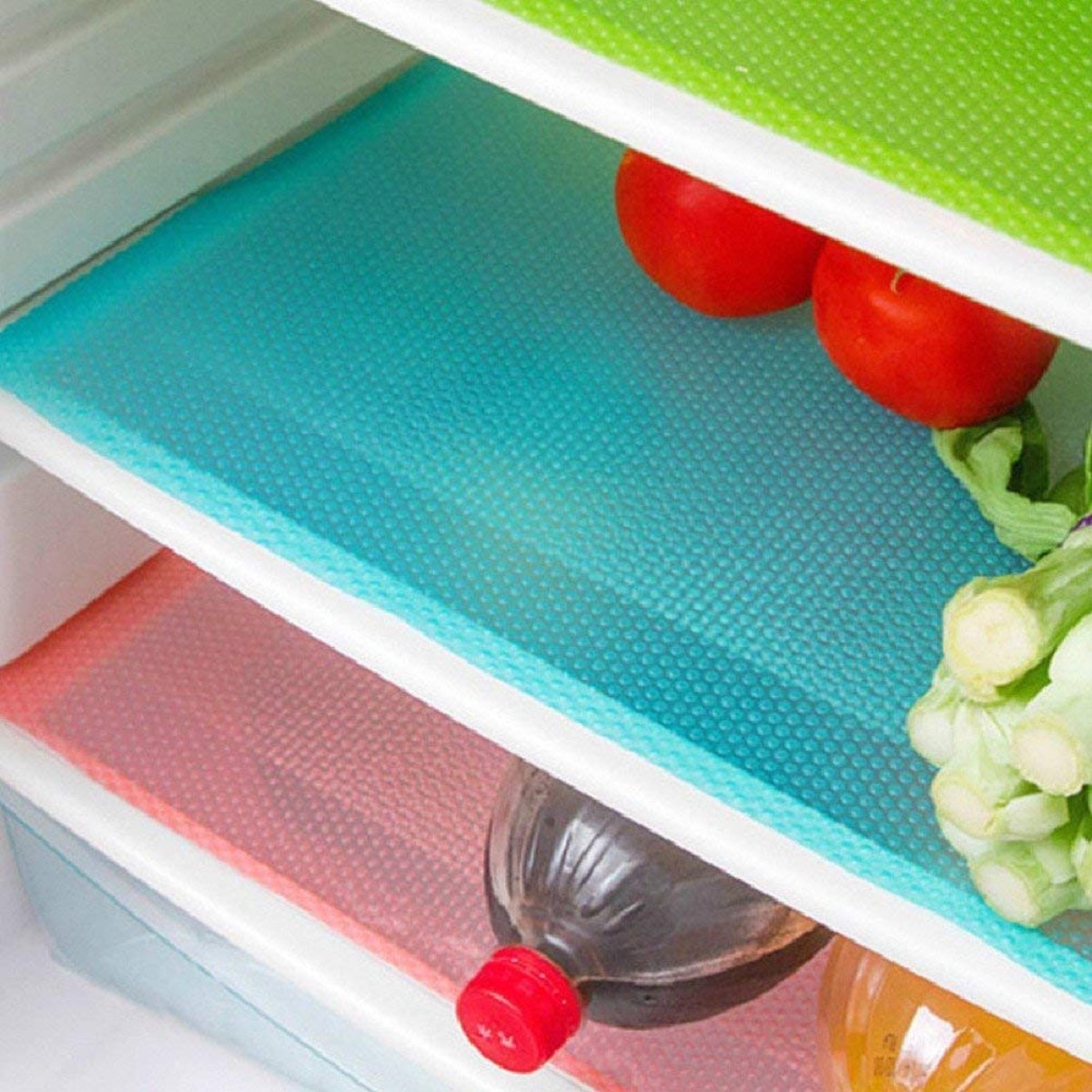 fridge with three shelves lined in bright colors, essential home supplies