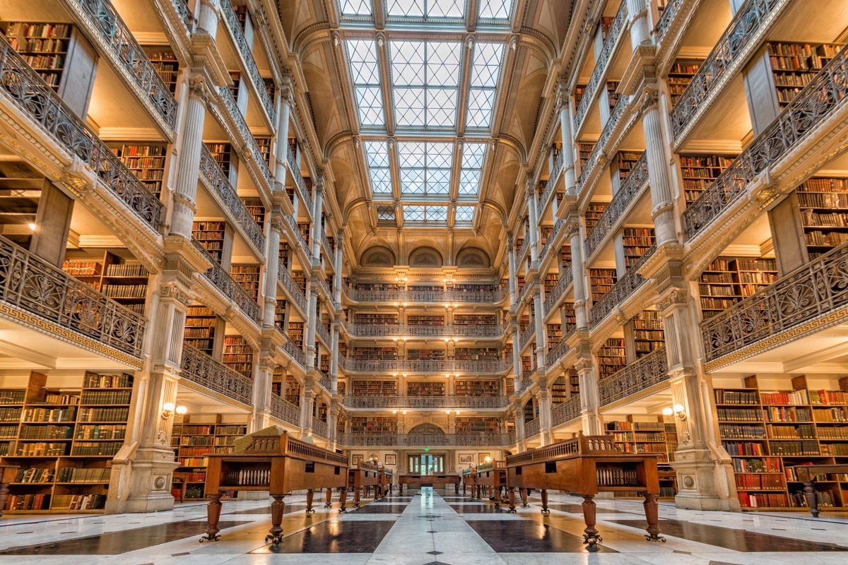 the george peabody library in baltimore maryland, beautiful libraries