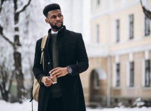 young man in black winter coat outdoors, winter coats for men