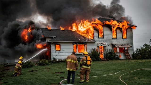 firefighters putting out house fire, fire prevention tips