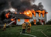 firefighters putting out house fire, fire prevention tips