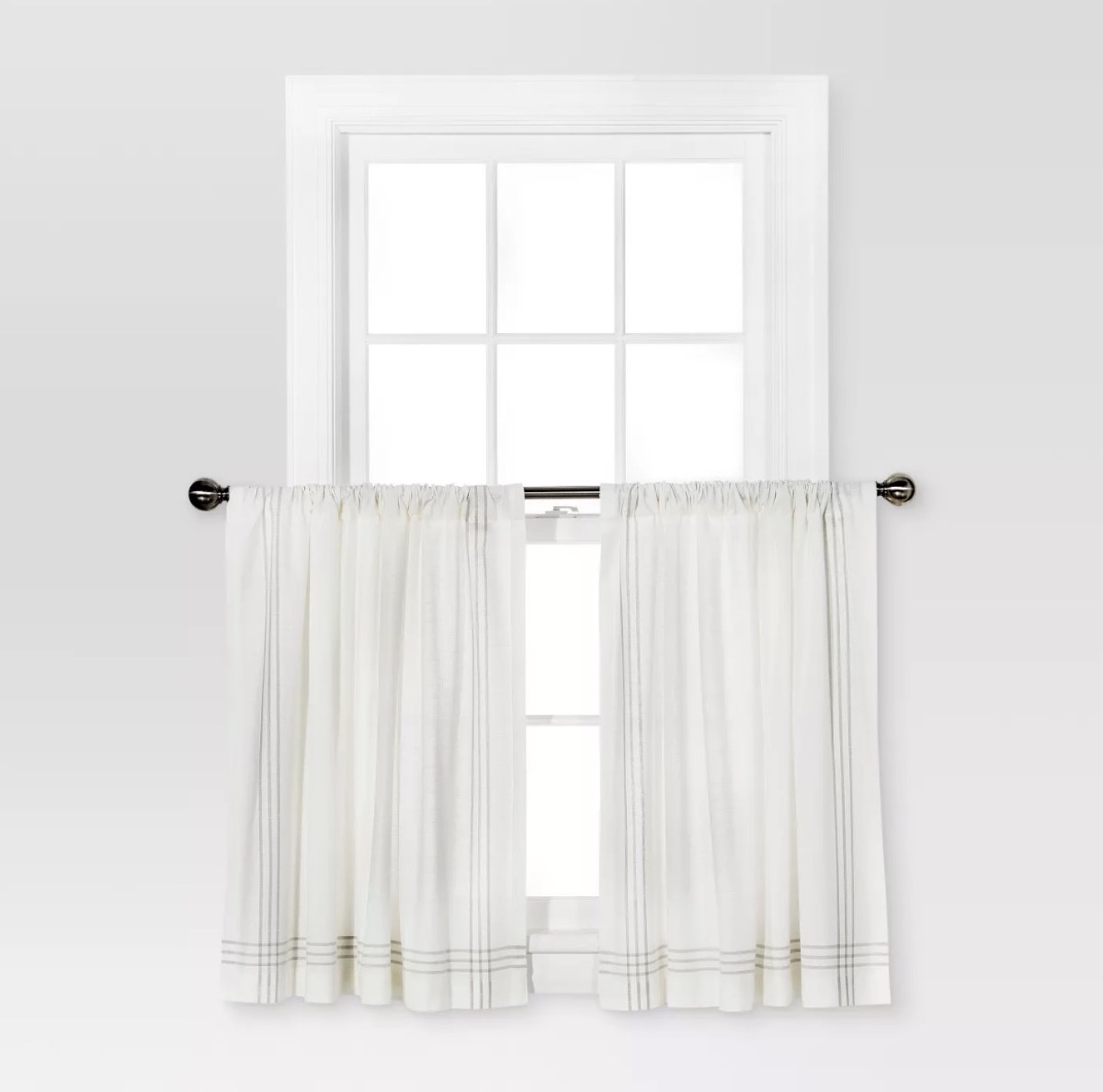 white cafe curtains on multipane window, kitchen decorations